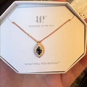 Elegant Gold and Black Pendant Necklace